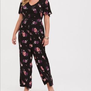 Torrid black floral jumpsuit with white dots
